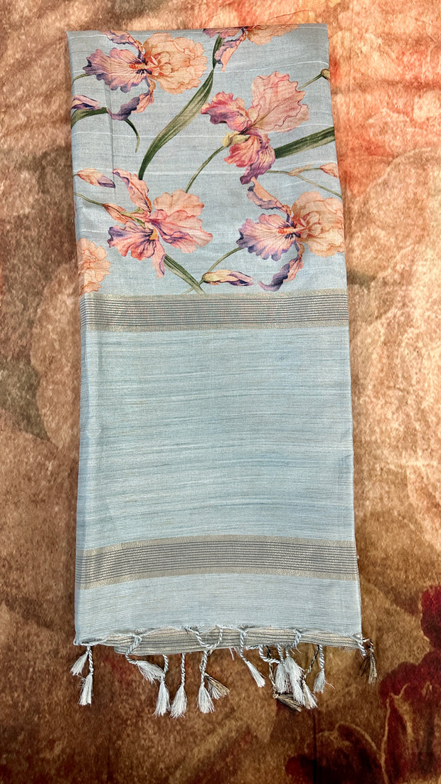 Icy blue floral printed semi tussar silk saree with stitched blouse