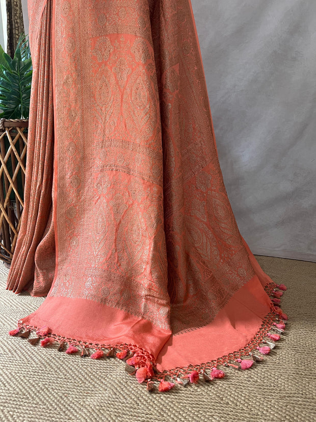 Pure Crepe silk saree with antique zari weave, stitched blouse