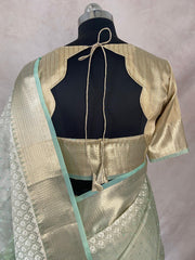Light green Tissue Kotta silk saree with mirror and chikankari work, with stitched blouse