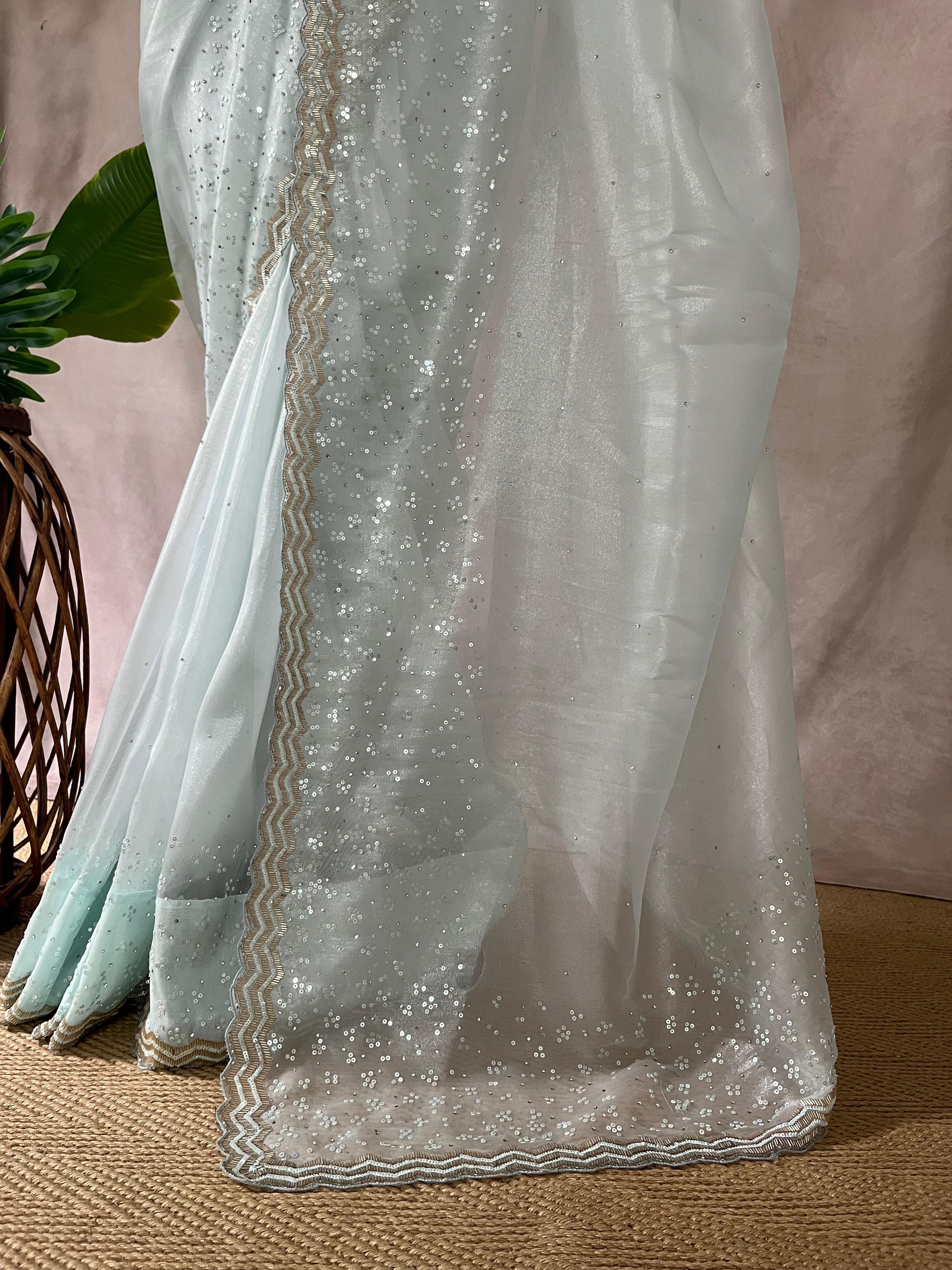 Light blue soft tissue organza designer saree with stitched blouse