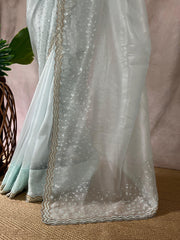 Light blue soft tissue organza designer saree with stitched blouse