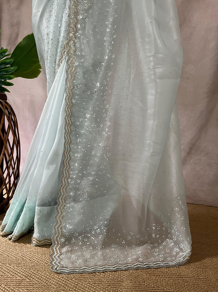 Light blue soft tissue organza designer saree with stitched blouse