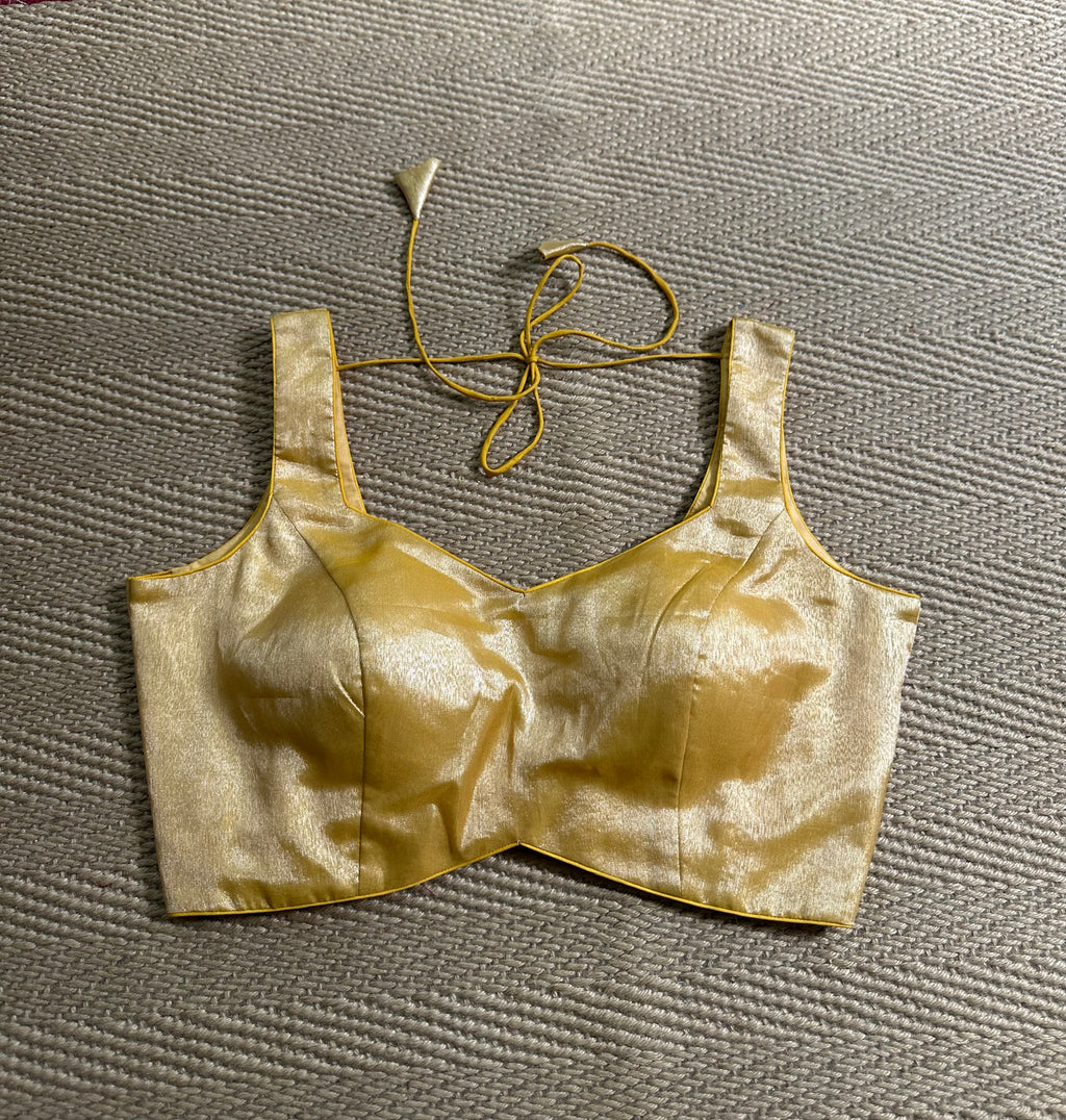 Gold tissue sleeveless blouse