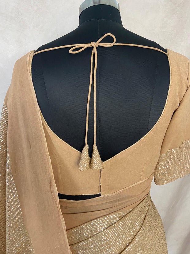 Chikku /Latte color georgette saree with gotta lines , stitched blouse