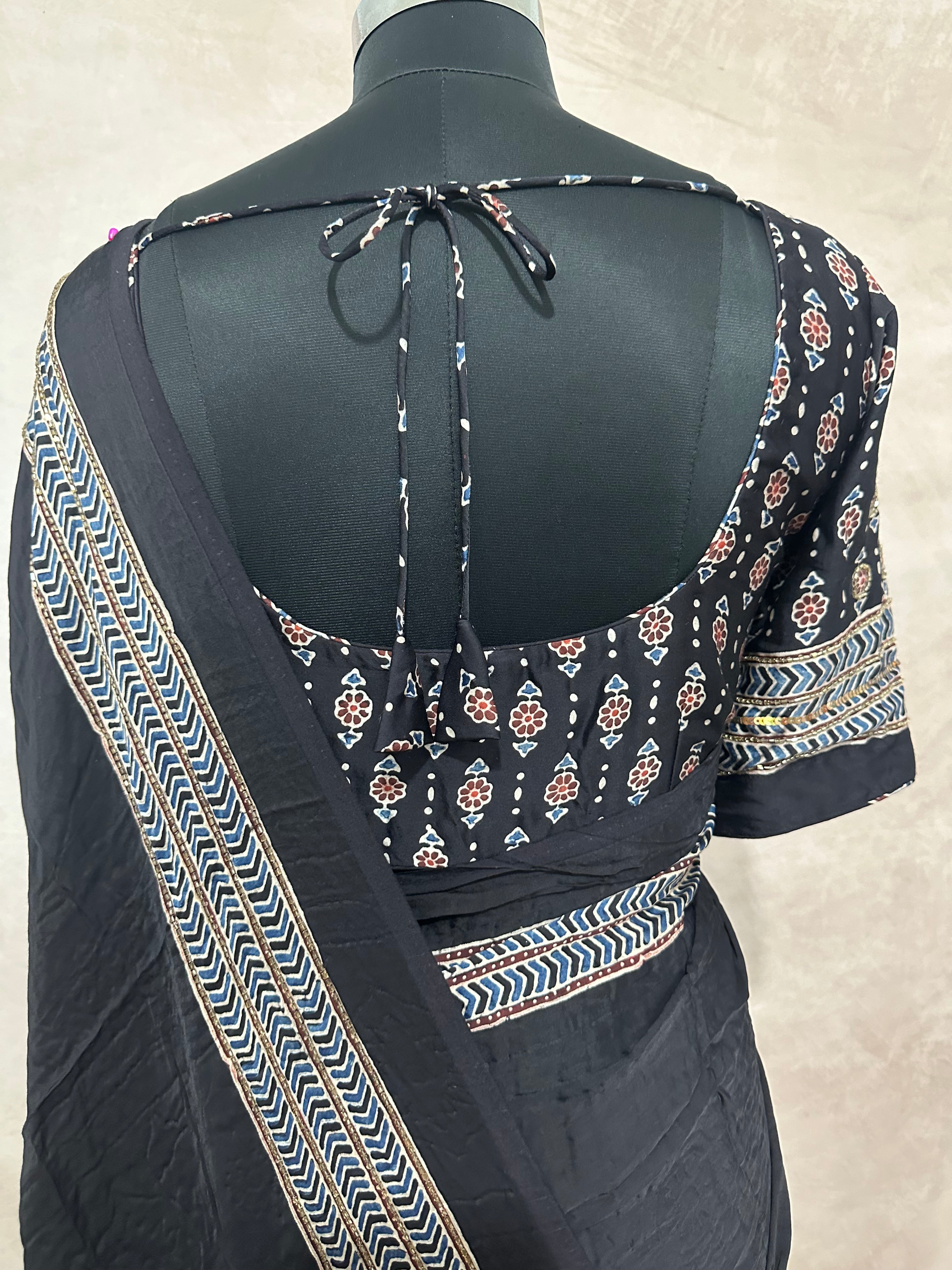 Modal silk saree with bead and mirror work , stitched blouse