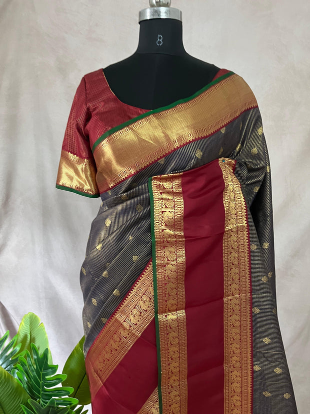 Navy blue and maroon Kanchivaram saree with stitched blouse
