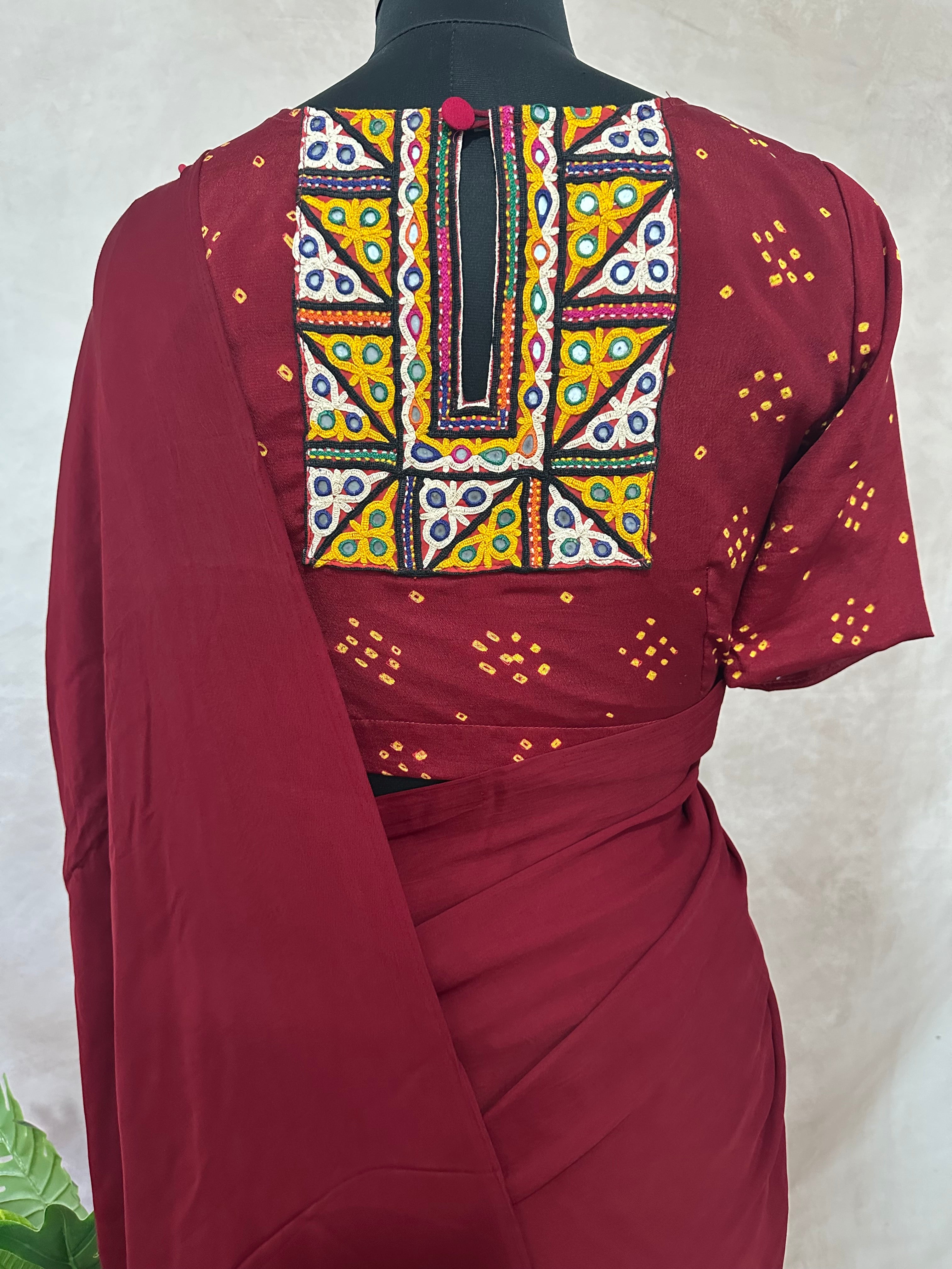 Crepe silk saree with bandini and kutch embroidery blouse