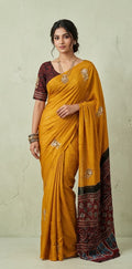 Modal silk saree with bead and mirror work , stitched blouse
