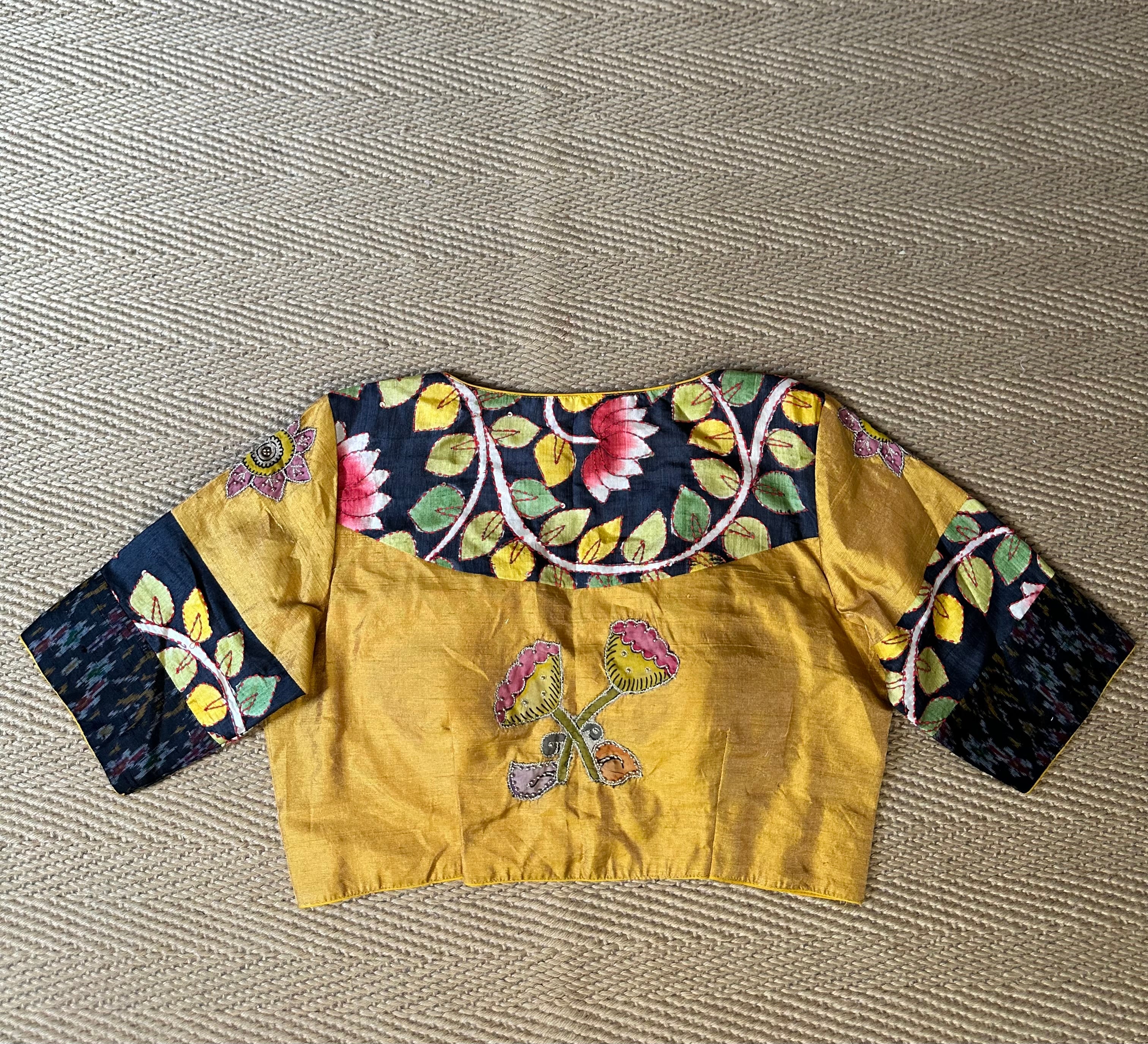Mustard yellow silk blouse with kalamkari patch and hand work