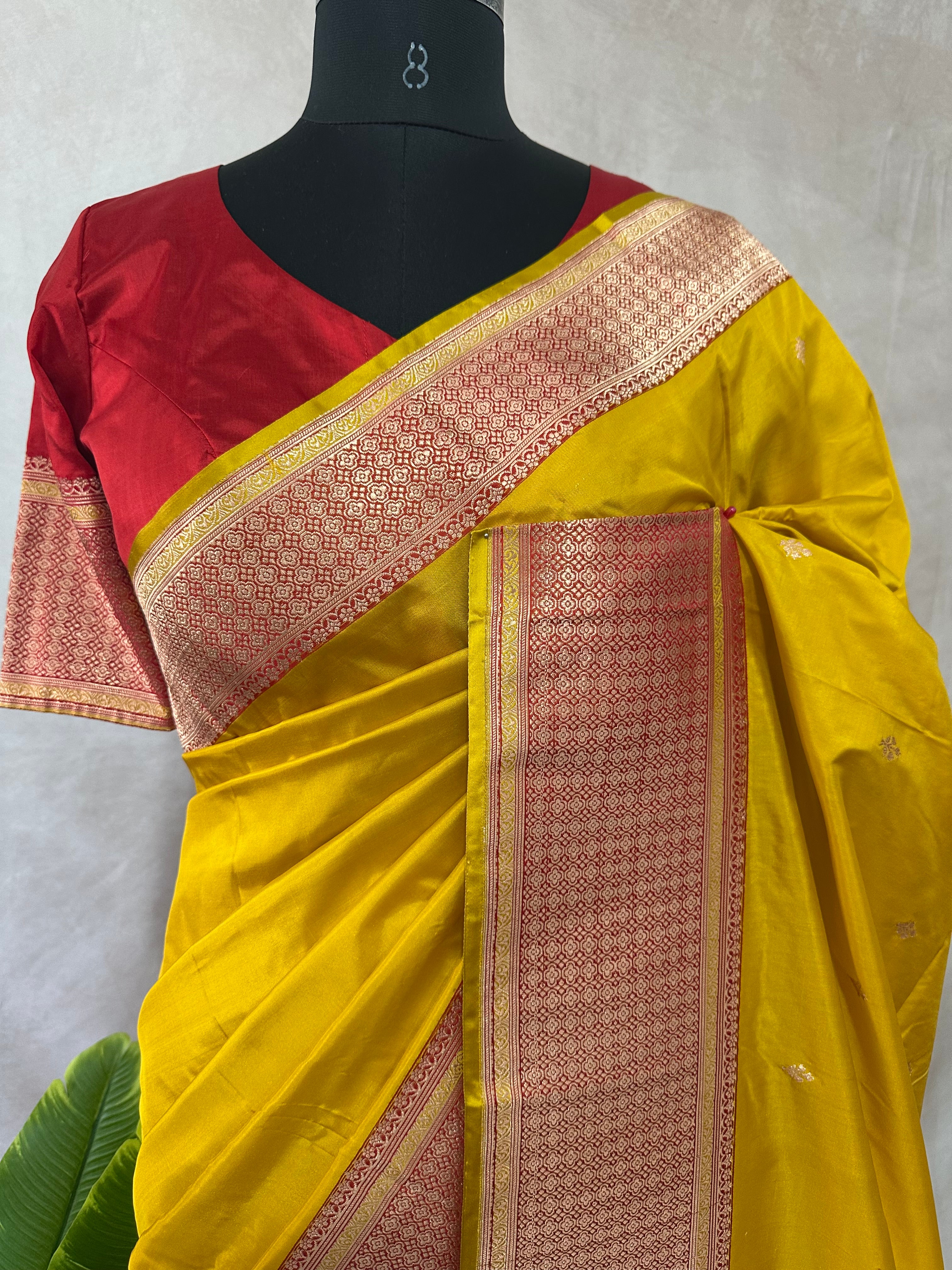 Yellow and red pure katan silk saree with stitched blouse