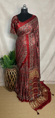 Red Ajrakh printed maroon modal silk saree with hadnwork and gharchola pallu, with stitched blouse
