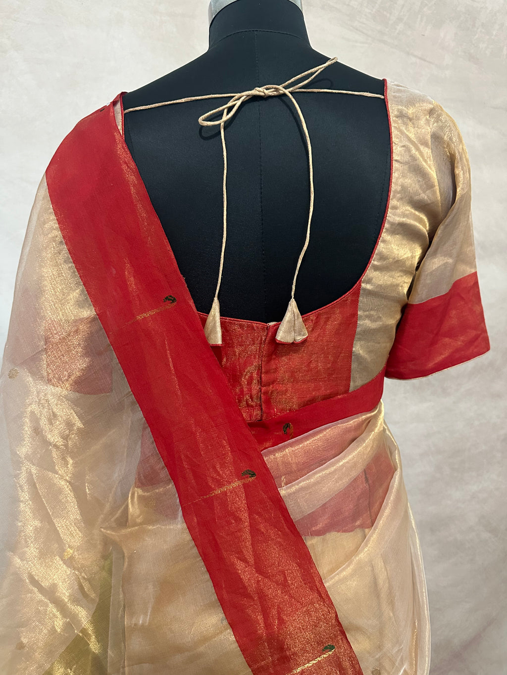Tissue Chanderi handloom saree with red border and muniya weave, stitched blouse