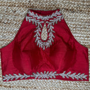 Red halter neck blouse with bead work