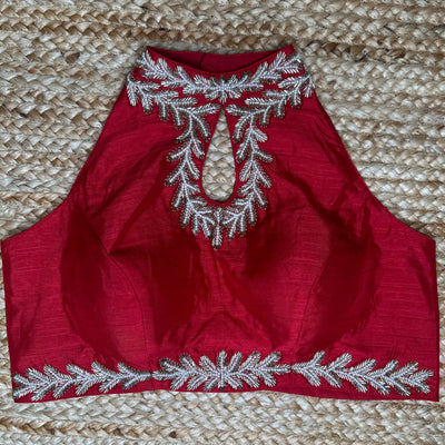 Red halter neck blouse with bead work