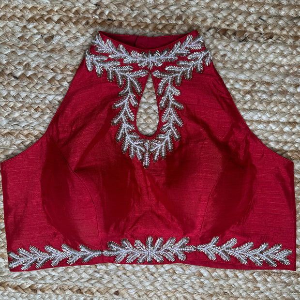 Red halter neck blouse with bead work