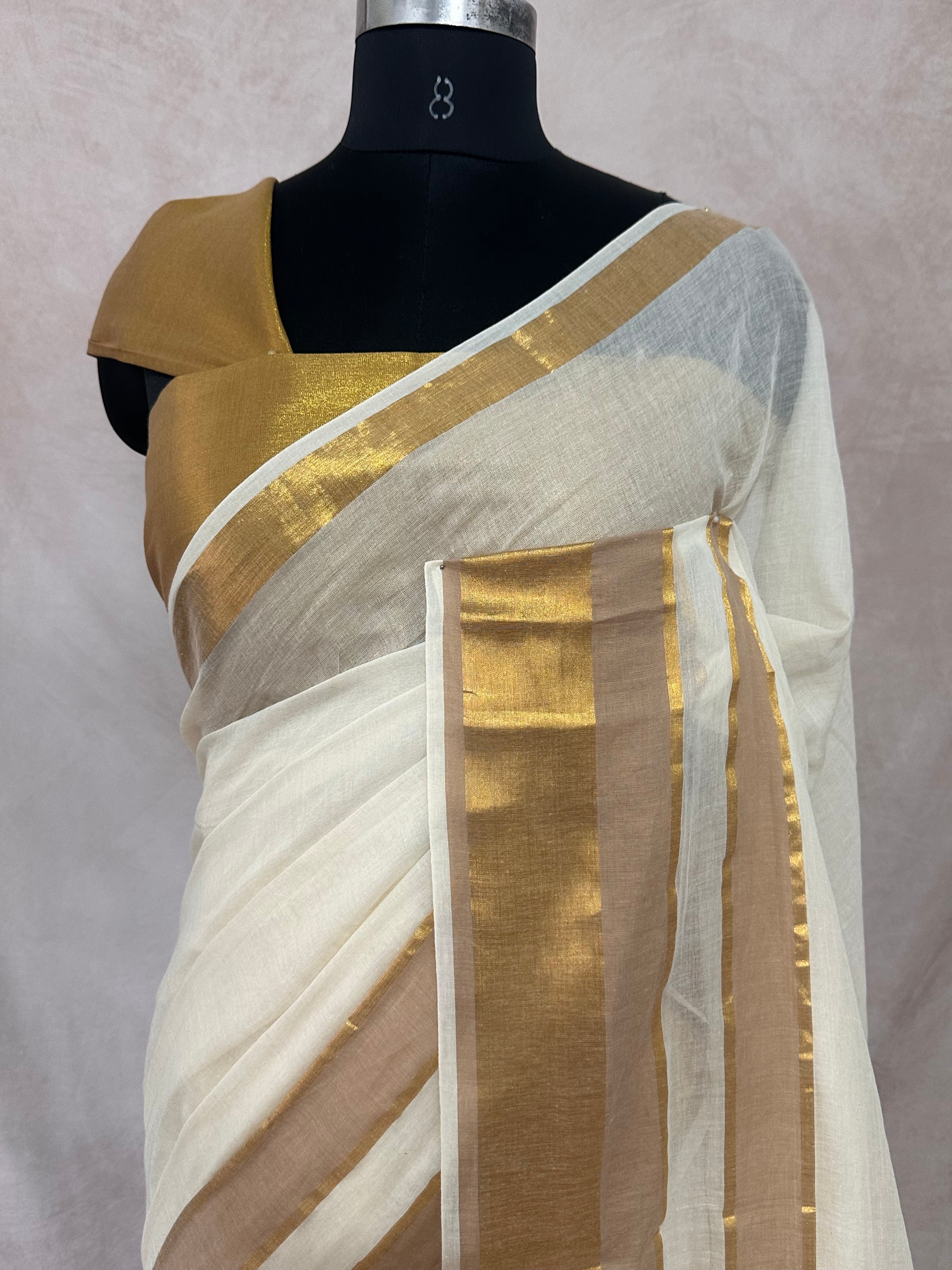 Gold 120 count mulcotton saree with zari lines