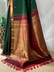 Bottle Green and marron Kanchivaram saree with stitched blouse