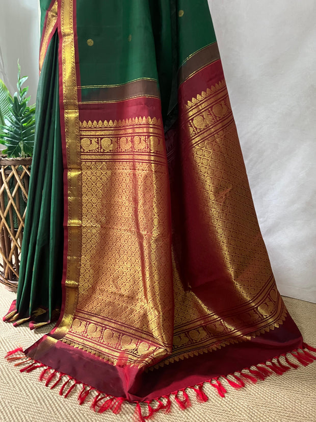 Bottle Green and marron Kanchivaram saree with stitched blouse