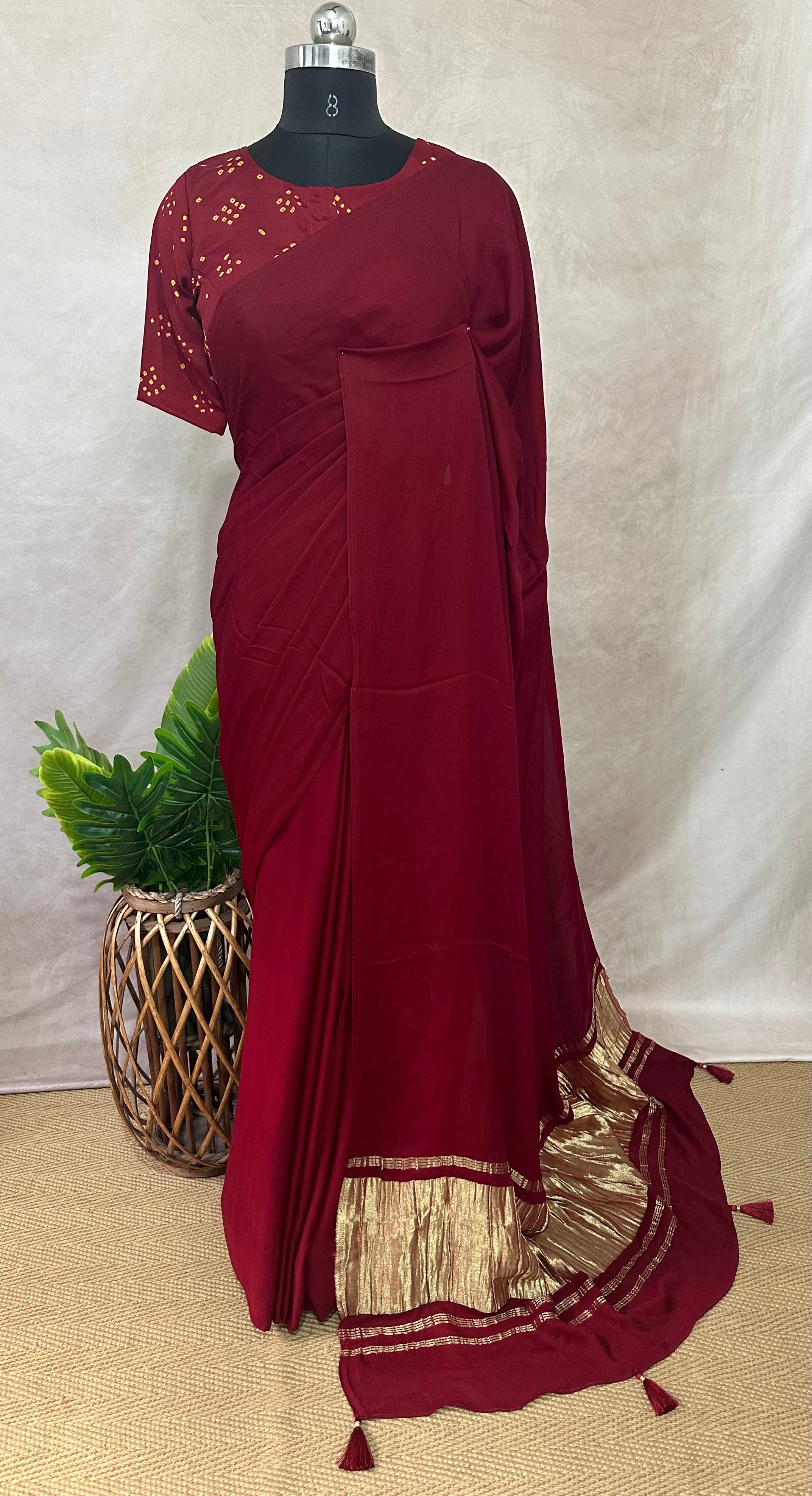 Crepe silk saree with bandini and kutch embroidery blouse