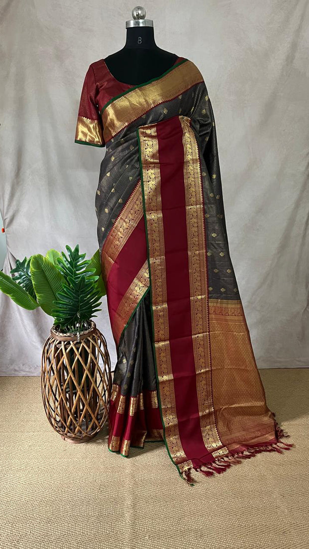 Navy blue and maroon Kanchivaram saree with stitched blouse