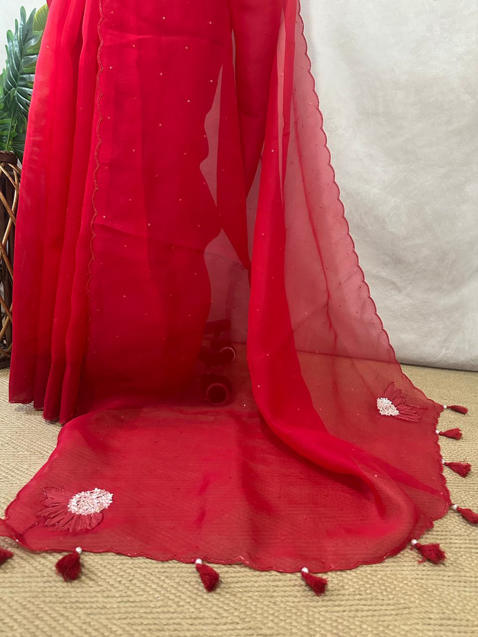 Red Organza silk saree with emroidery , stitched blouse