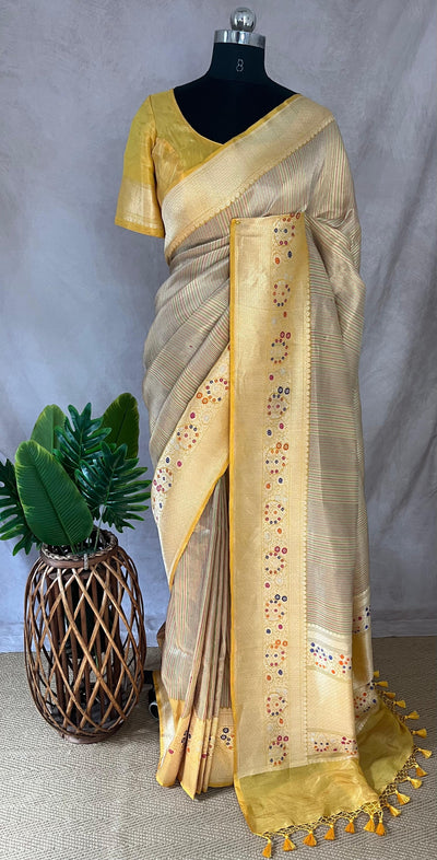Yellow tissue organza saree with katan border with meenakari weave, stitched blouse