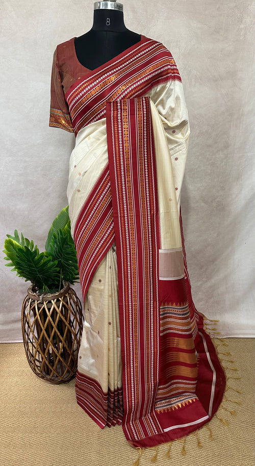 Asam silk saree with Red broder and stitched blouse