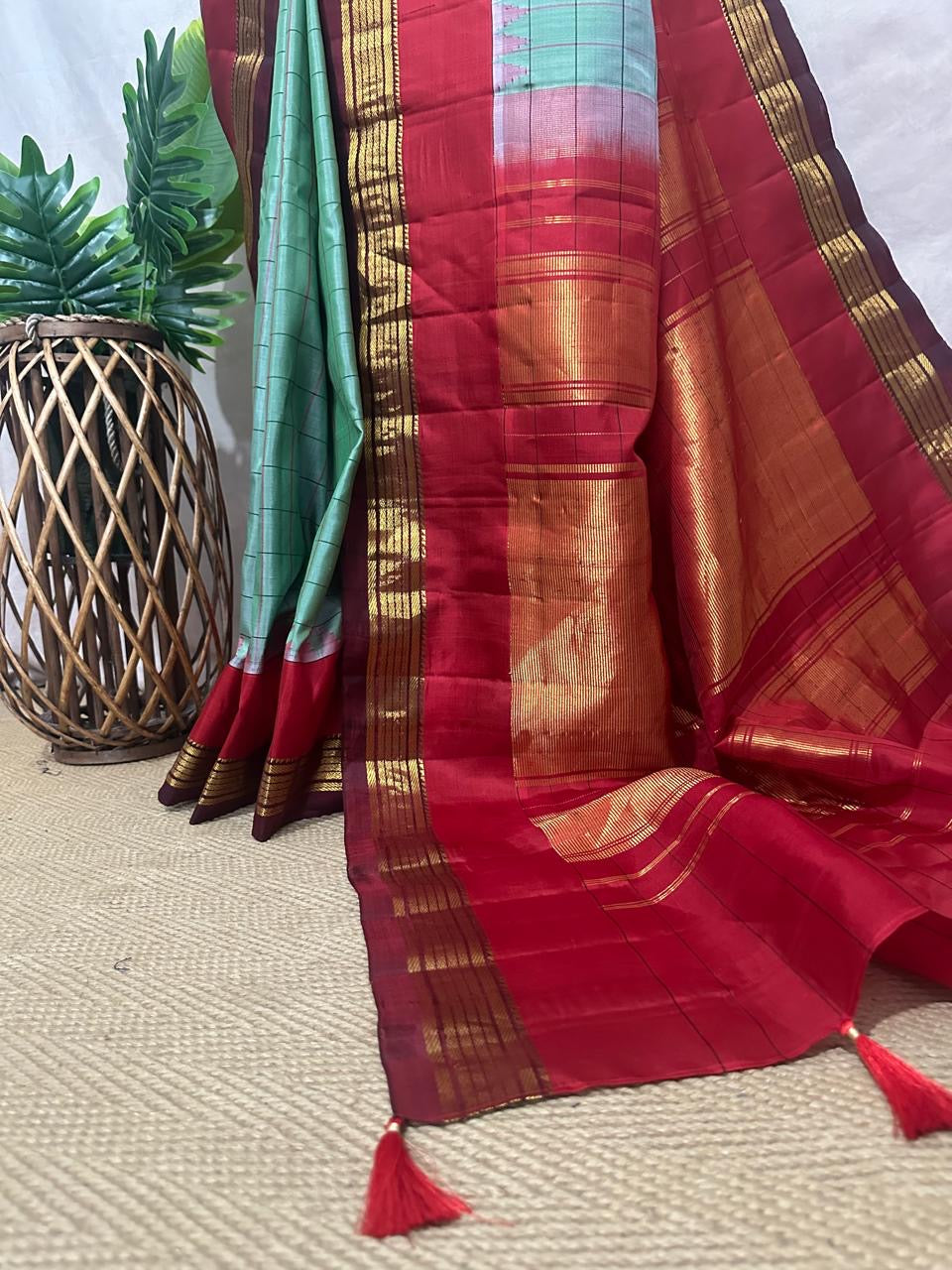 Handloom pure silk cotton green gadwal silk saree with stitched blouse