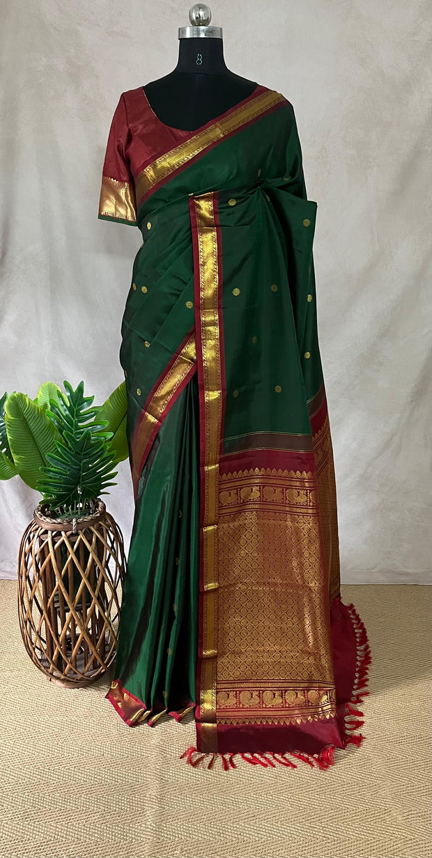 Bottle Green and marron Kanchivaram saree with stitched blouse