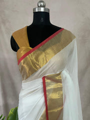White mulcotton saree with a gold and red border (no Pico and fall)