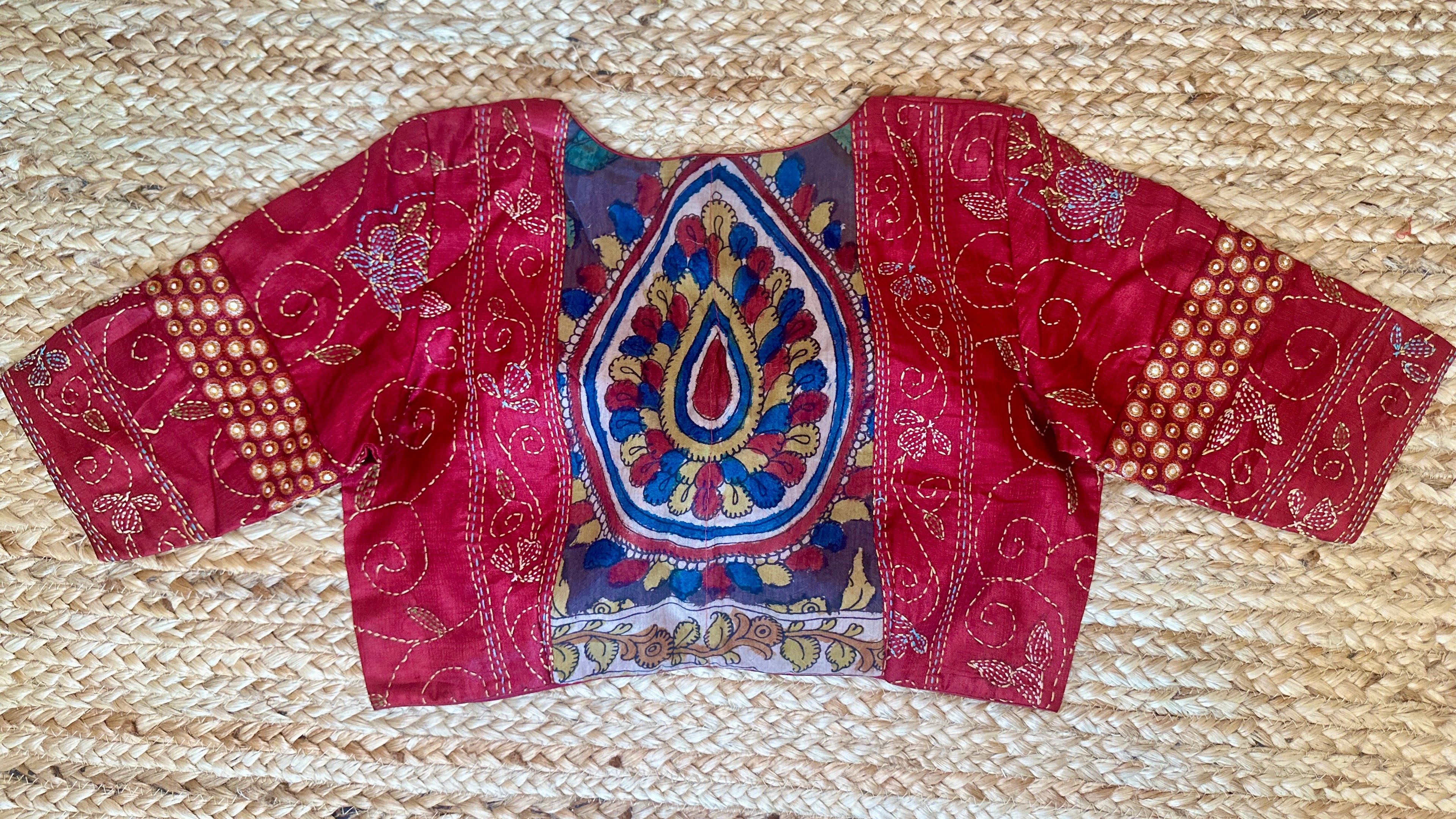 Red patch work blouse with kantha work