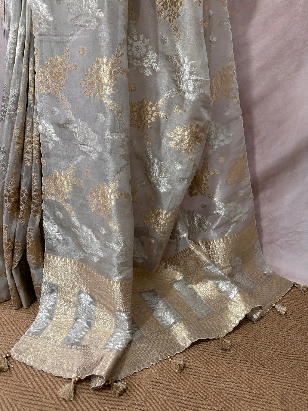 Silver tissue saree with gold floral weave, with stitched blouse