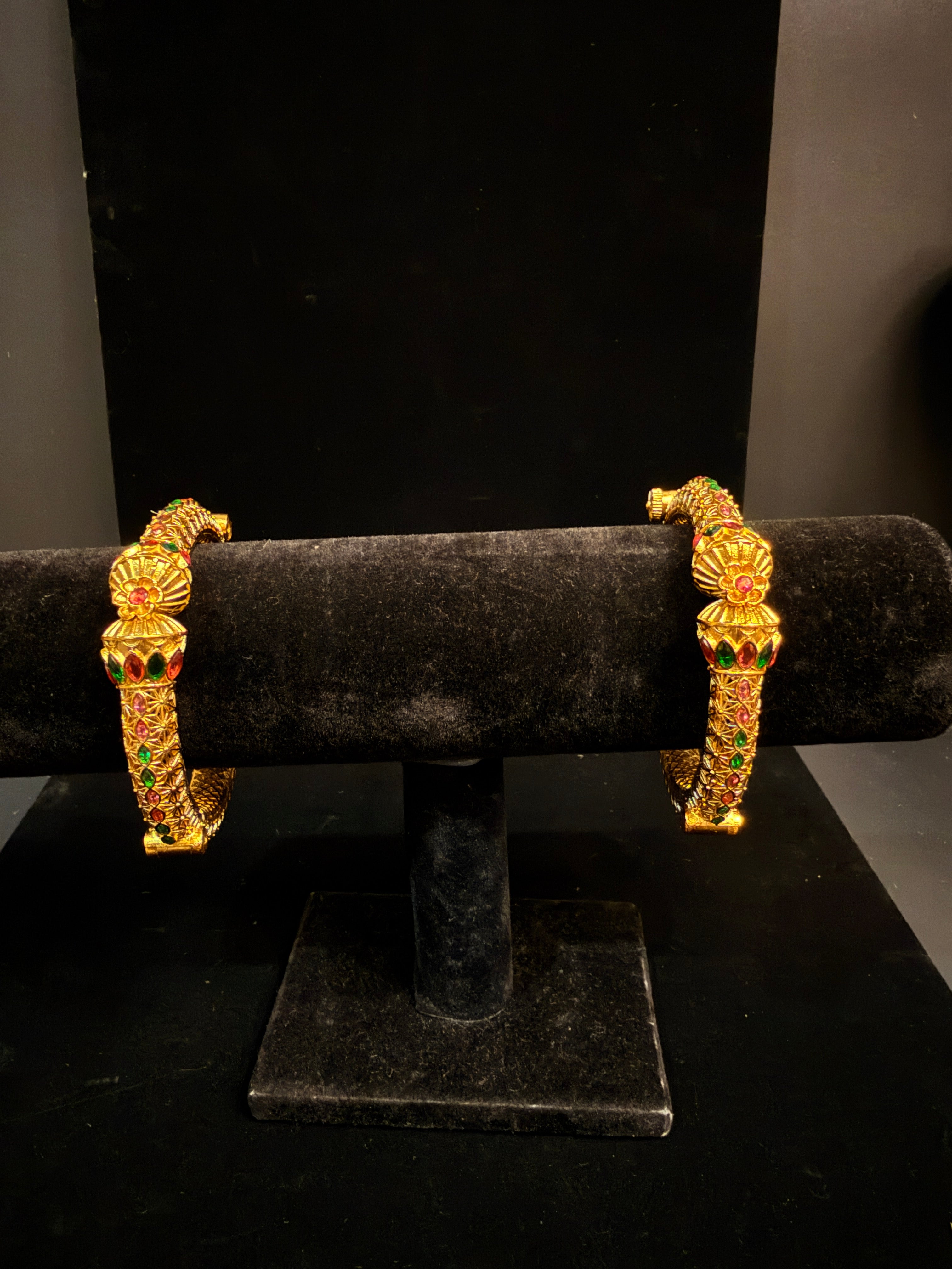 Gold openable kada with red and green stone (fits 2.6 to 2.10)