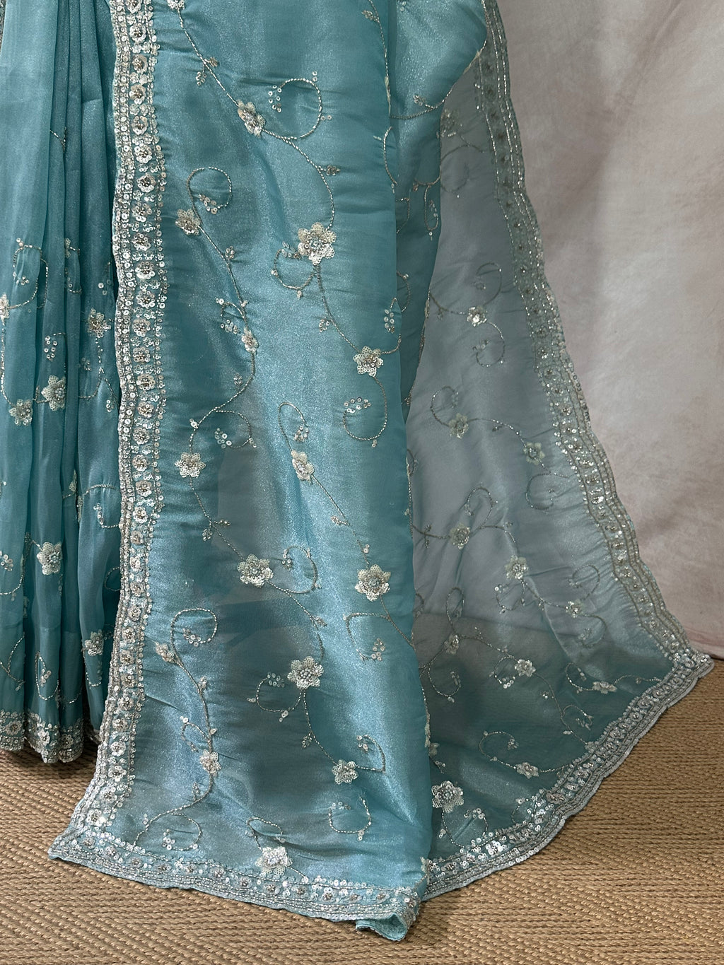 Blue tissue designer saree with stitched blouse and under skirt