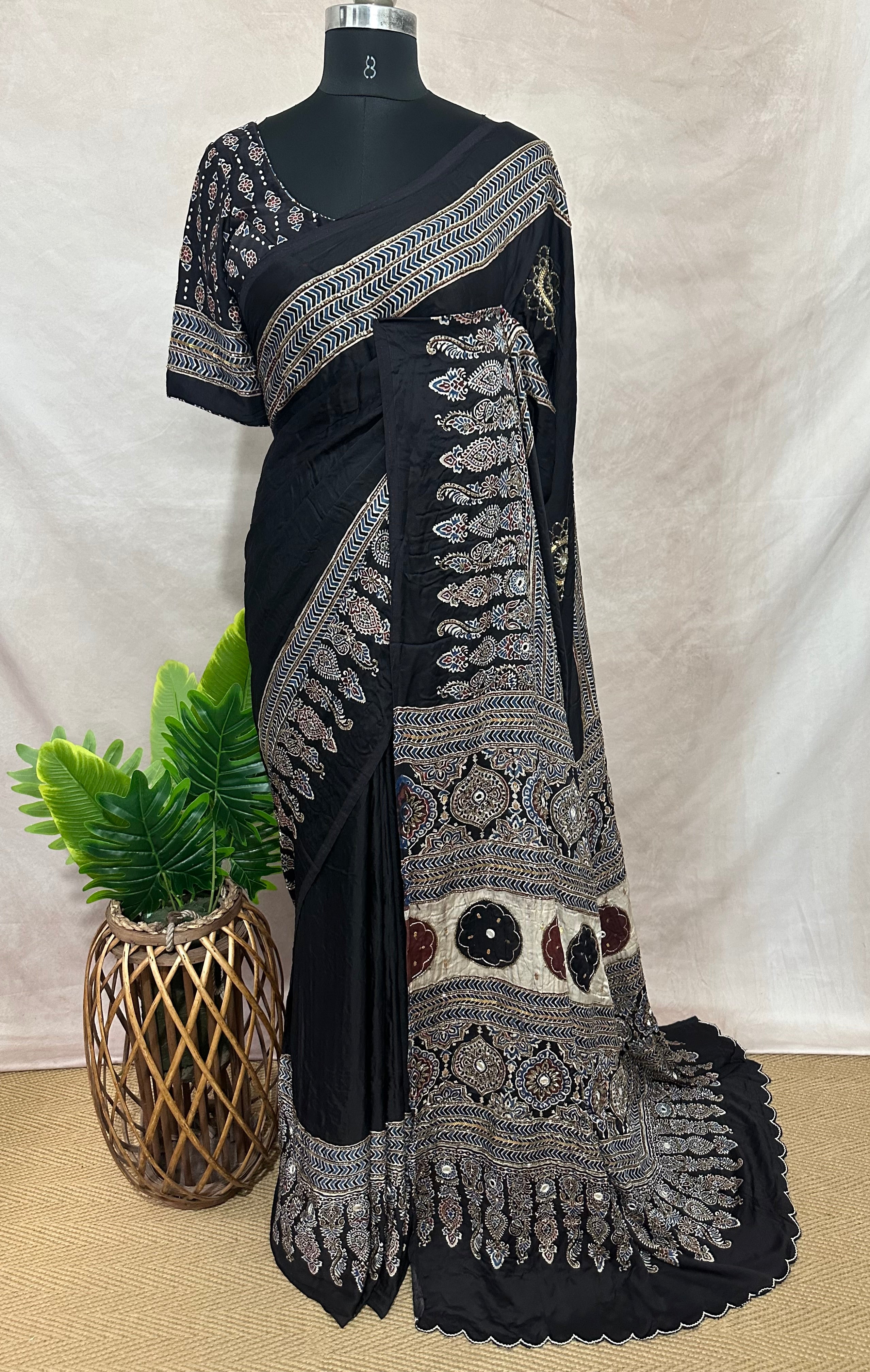 Modal silk saree with bead and mirror work , stitched blouse
