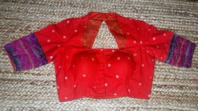 Orange blouse with kalamkari and kanta patch work
