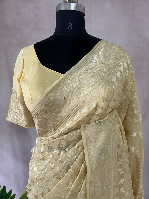 Light yellow pure Geogette silk saree with stitched blouse
