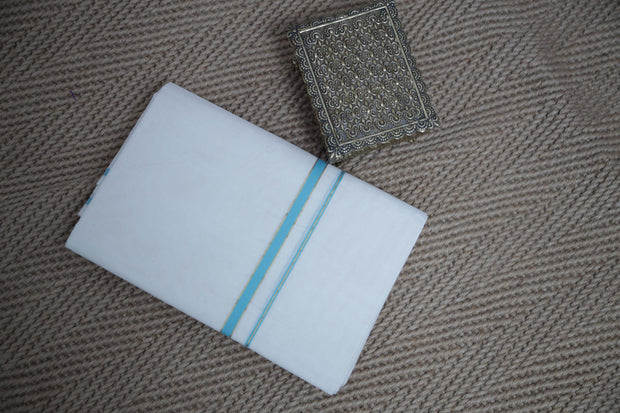 Puliyilakkara set mundu with light blue and gold border