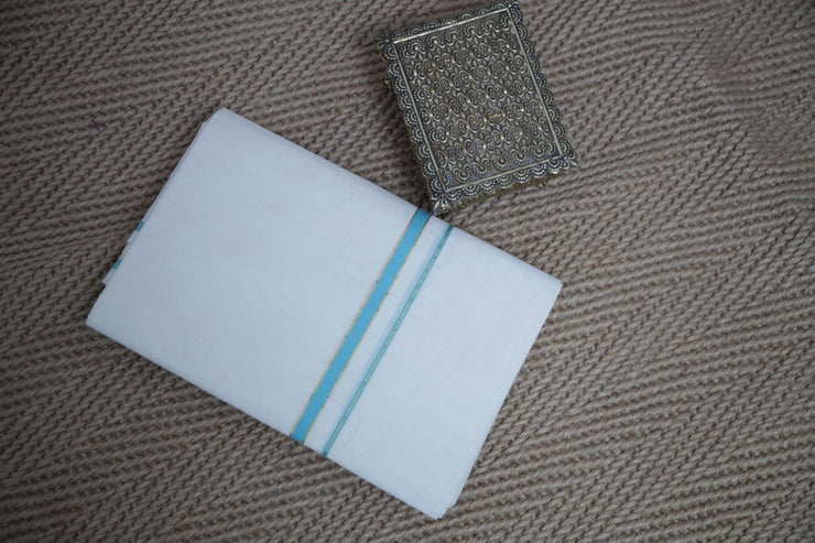 Puliyilakkara set mundu with light blue and gold border