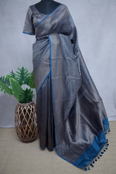 Blue brocade organza saree with stitched blouse