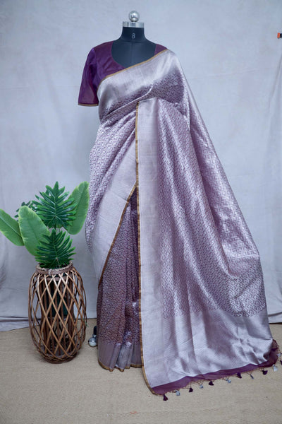 Deep burgundy brocade organza saree with stitched blouse