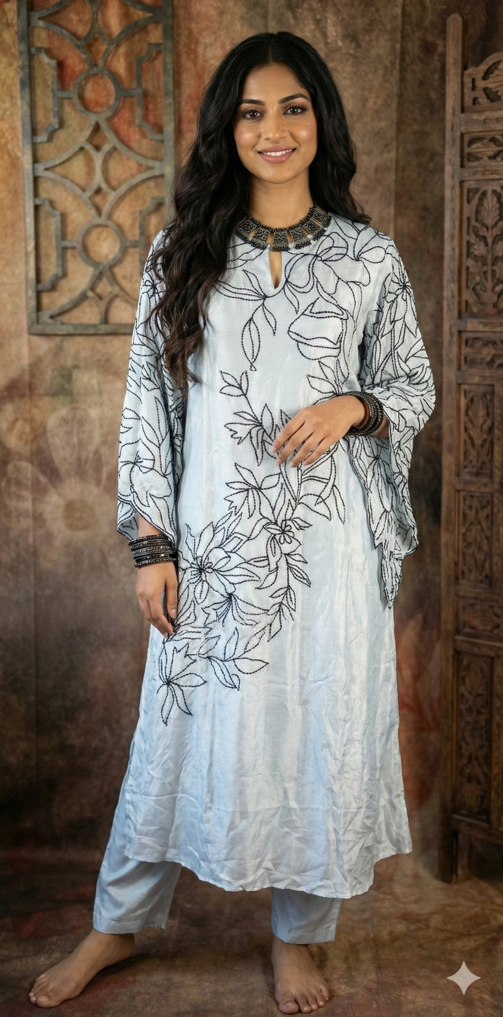Pastel blue silk kurti with sleeve pattern