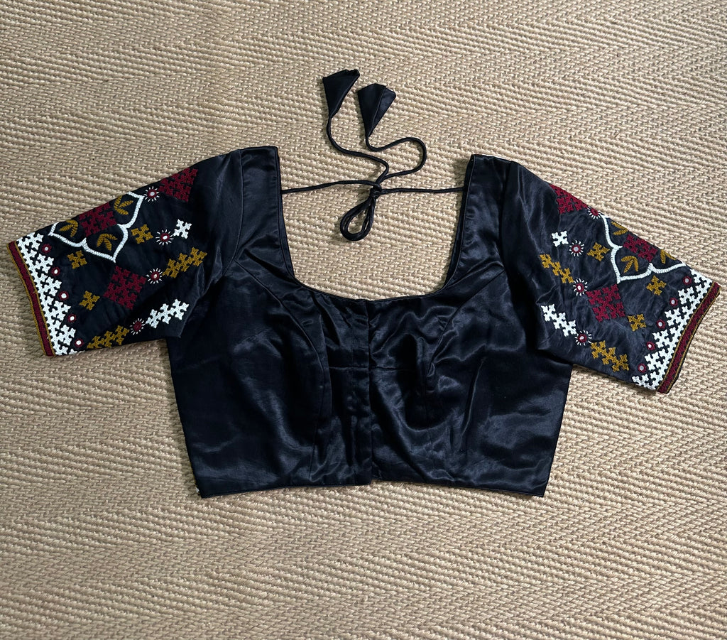 Black modal silk blouse with mirror work and hand Kutch Embroidery