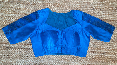 Blue raw silk blouse