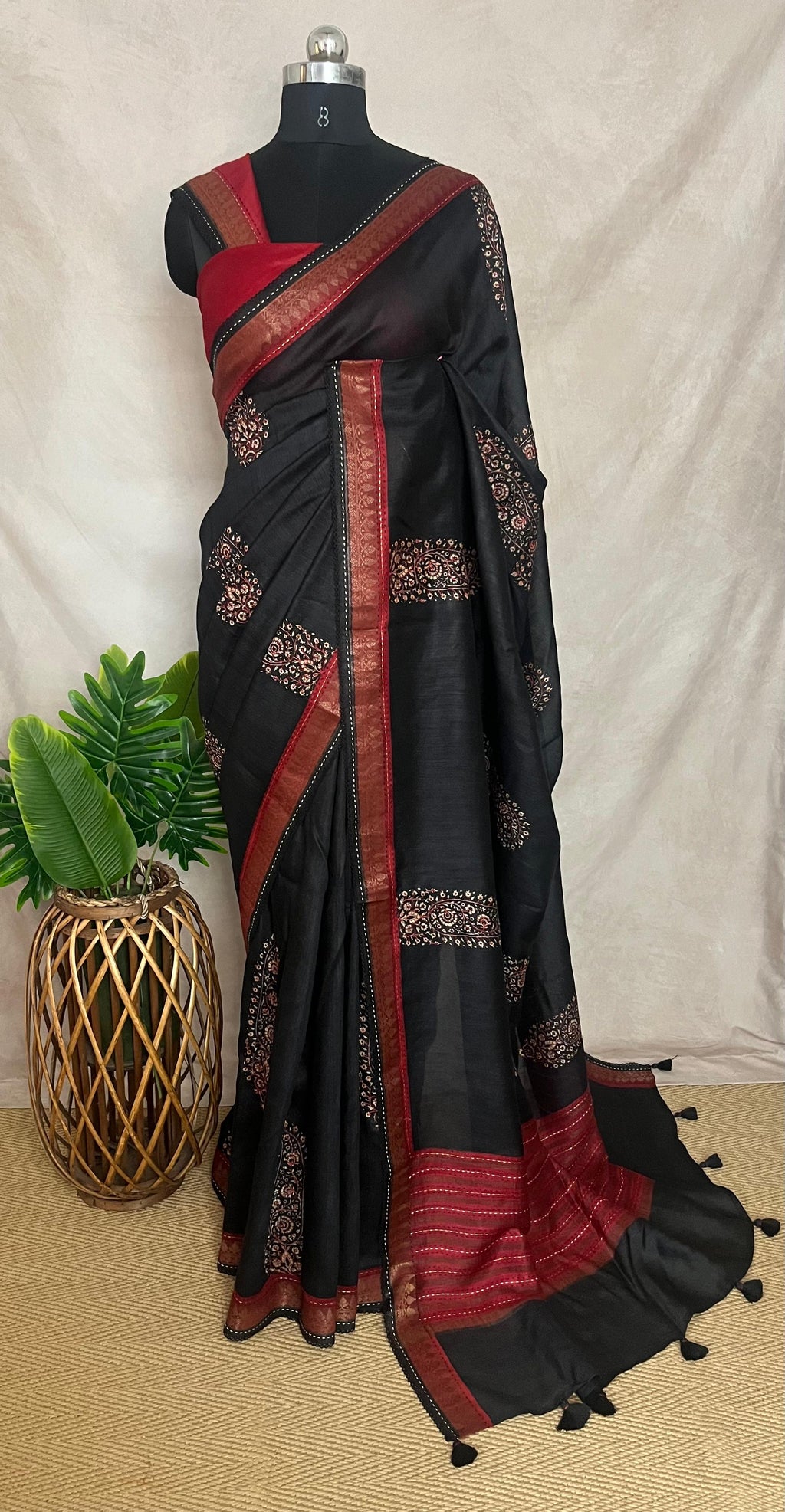 Black and red blended tussar silk saree the block print and highlighted with embroidery, with BP