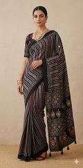 Designer Ajrakh modal silk saree with bead and mirroer handwork, stitched blouse