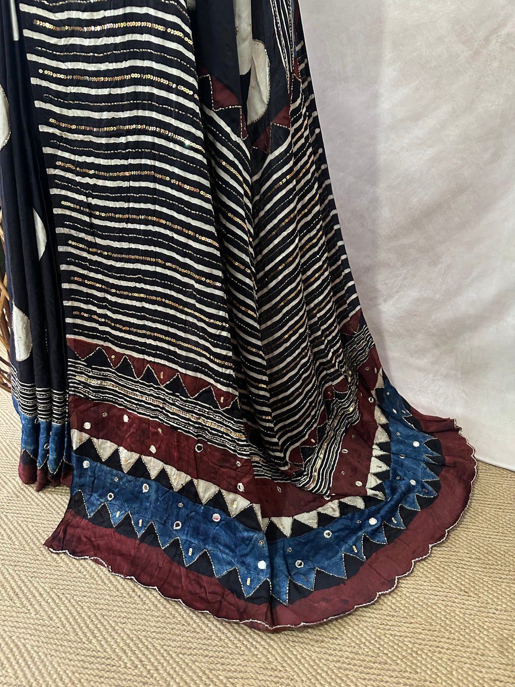 Modal silk saree with bead and mirror work , stitched blouse