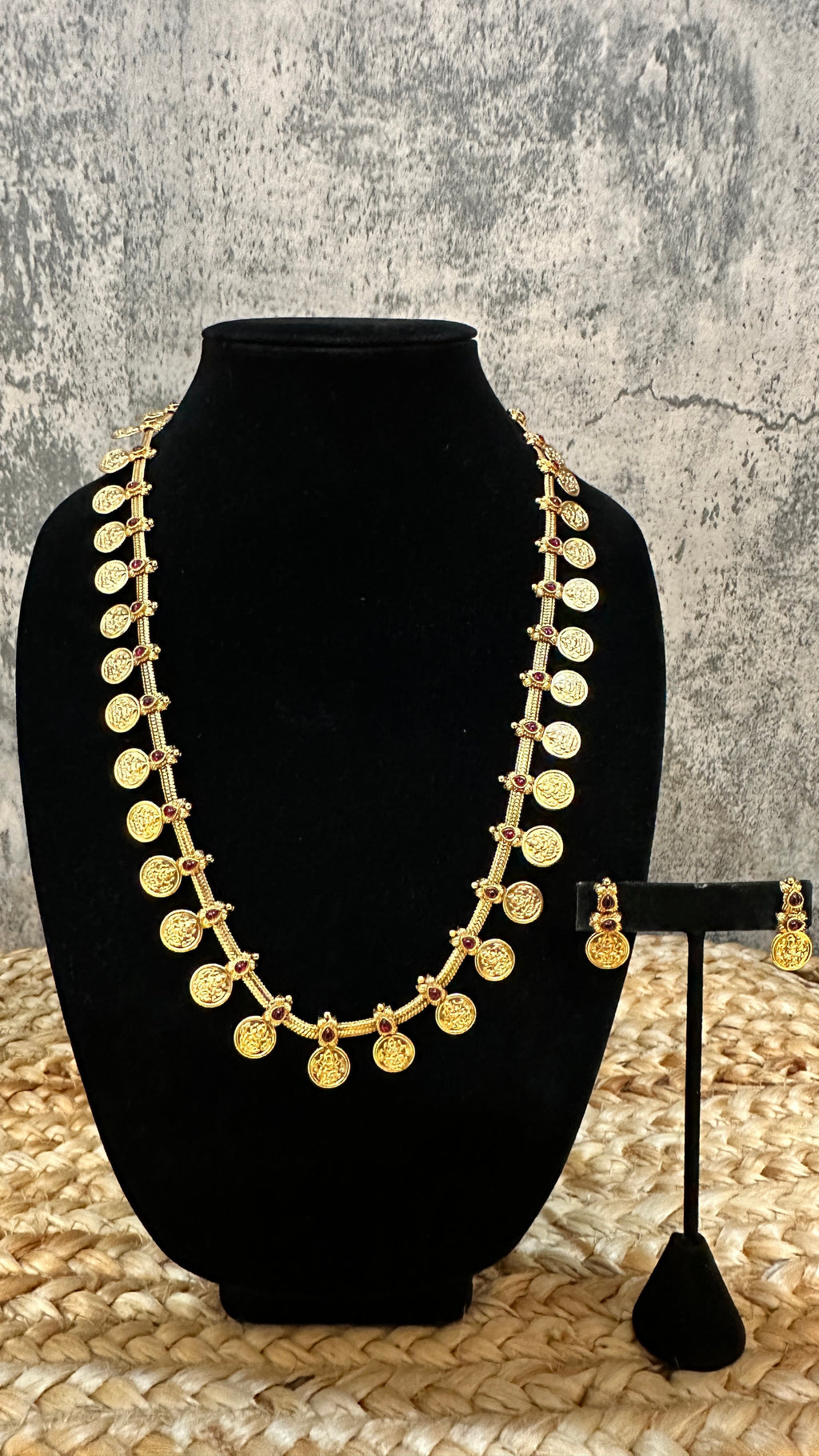 Kasumala with ruby red stone