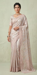 Tissue organza designer saree with hand emroidered border and pallu, with blouse