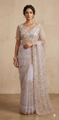 Heavy Embroidered Net Saree with stitched blouse and under skirt